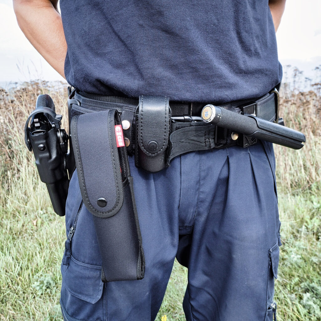 Police Enhance Fire Safety, Police officer wearing MAUS fire suppression device